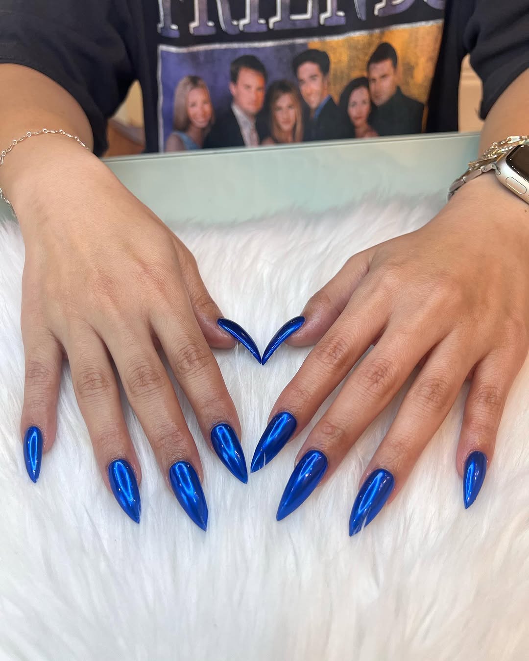 Glossy chrome cobalt-blue stiletto nails